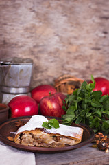 Strudel with apples and nuts.