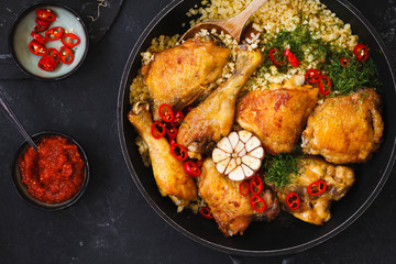 Fried chicken stew. Skillet Fried chicken with vegetable. Crispy fried chicken meat. Top view. 