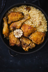Fried chicken stew. Skillet Fried chicken with vegetable. Crispy fried chicken meat. Top view. 