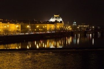 Fototapeta na wymiar The night View on Prague National Theater with Vltava river, Czech Republic