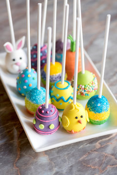 Homemade Easter cake pops served in the plate,selective focus