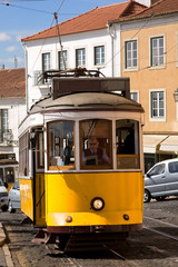 Fototapeta na wymiar Historic trolley car in downtown Lisbon, Portugal