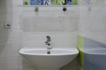 Real small bathroom in blue and green colors