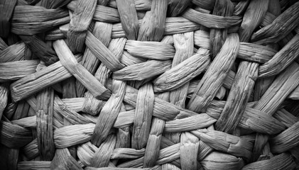 Wicker straw background. Black and white. Vignette.