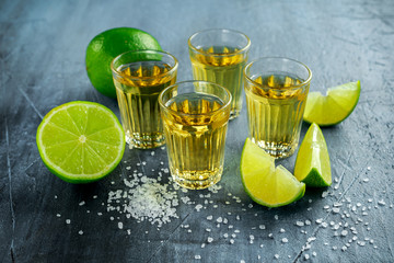 Gold Tequila shots with lime and sea salt