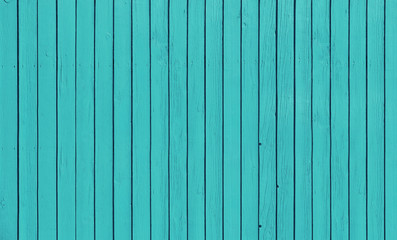 Fototapeta na wymiar Wooden fence with parallel planks with blue paint.