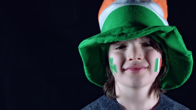 4K Child Celebrating St. Patrick's Day Smiling with Hat