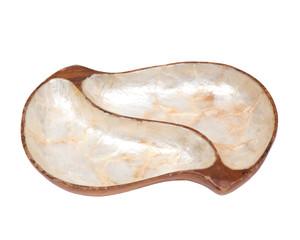 Mother of pearl lined genuine monkey pod, vintage wooden bowl isolated on white background