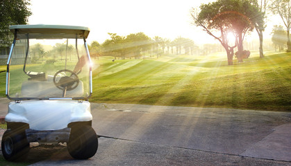 Golf car on the golf course © sittinan