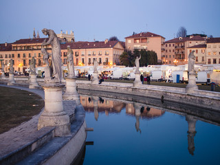 Fototapeta na wymiar Canal on square Prato della Valle in Padova city.