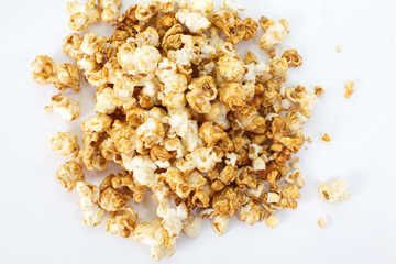 Unhealthy popcorn snacks on a white background