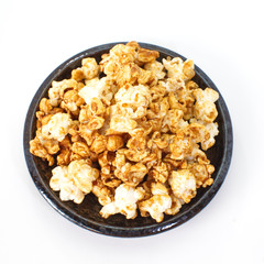 Unhealthy popcorn snacks on a white background