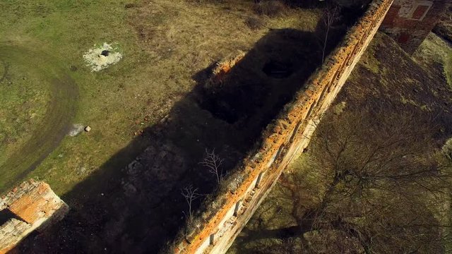 4K aerial Ruins of the old castle on a sunny day