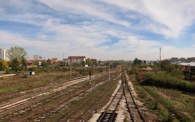 Fototapeta na wymiar Train track leading to somewhere in South East Europe