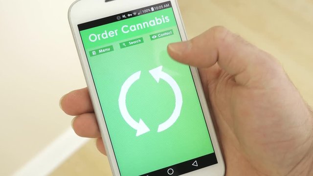 Shopping for marijuana on a smartphone device.