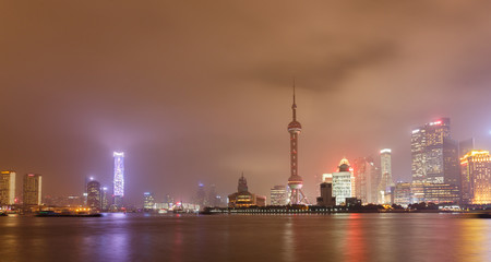 Obraz na płótnie Canvas Modern city night scene, skyscraper in shanghai,chian