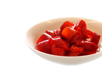 Red pickled-chilli mix with vinegar.