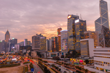 Aerial view of cityscape of landmark buildings along the Lung Wo Road, a road between Central and Wan Chai district in Hong Kong island at sunset.