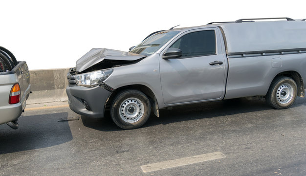 Car crash from car accident on the road in a city car pickup wait insurance.