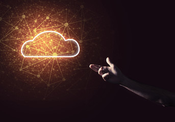 Digital cloud icon as symbol of wireless connection on dark back