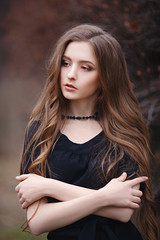Beautiful girl portrait with a fish in her hands