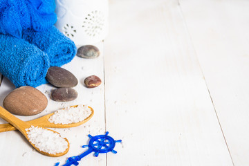 Still life for spa with towel, salt and stones