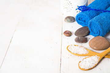 Spa still life with towel, salt and stones