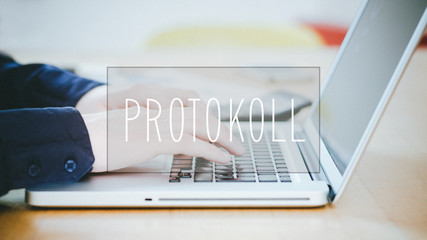 Protokoll, German text for Protocol text over young man typing on laptop at desk