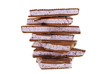Blueberry nougat in chocolate on a white background