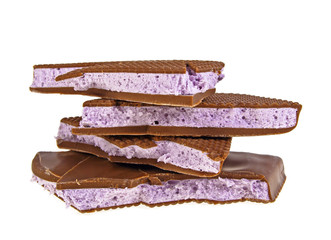 Blueberry nougat in chocolate on a white background