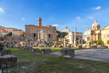 Rome, Italy. Ruins of the Roman forum: the temple of Saturn, the temple of Vespasian, Tabularia,...