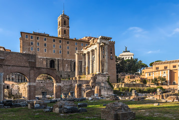 Rome, Italy. Ruins of the Roman Forum: the temple of Saturn (489 BC - 283 AD) against the...