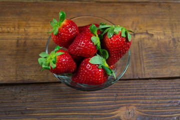 Red strawberry in a bowl