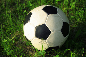 Football on green grass