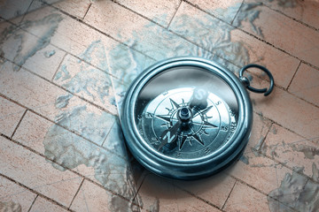 Compass on map background