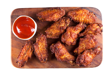 fried chicken with ketchup on white background