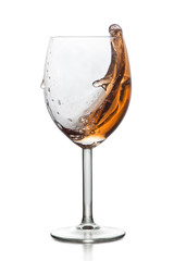 Splashing drink in glass
