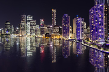 Brisbane cityscape reflections by night on the Brisbane river, viewed from the Story Bridge. - obrazy, fototapety, plakaty