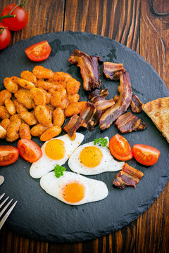 Fried Eggs With Beans and Bacon