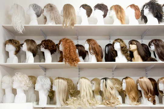 Row of Mannequin Heads with Wigs