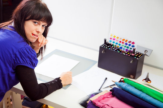 Fashion Designer In Her Studio