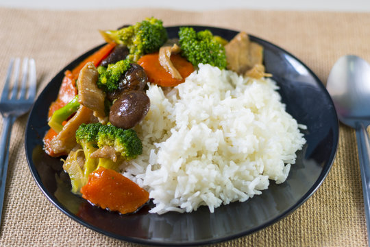 Rice and mixed vegetables in oyster sauce