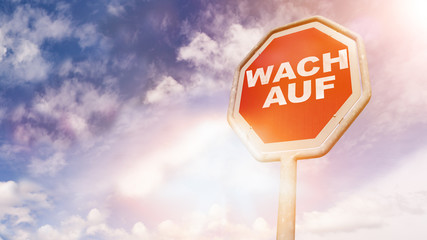 Wach auf, German text for Wake up text on red traffic sign