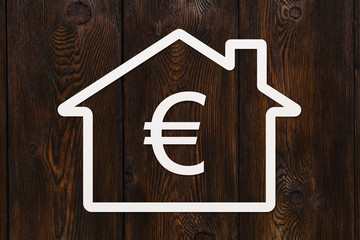 Paper house with euro inside. Conceptual image