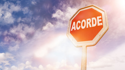 Acorde, Portuguese text for Wake up text on red traffic sign