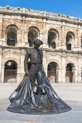 Nimes, Gard, arenas, exterior facade with bullfighter statue