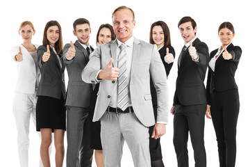 Business team showing thumb up