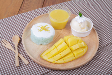 dessert sweet sticky rice with mango coconut milk