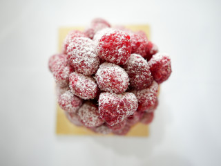 Close up raspberry tart with white background