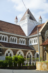 Fototapeta na wymiar all saints stone church with a tiled roof in a tropical country Sri Lanka